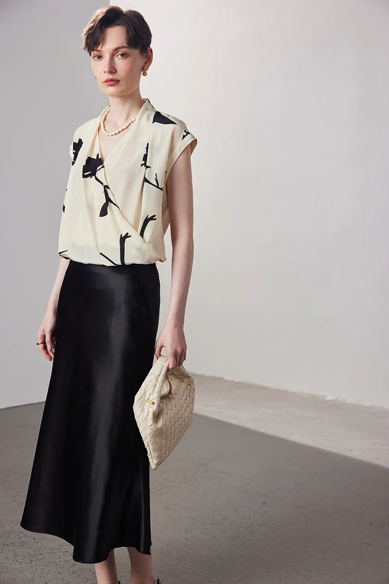 Sleeveless printed V-neck silk blouse
