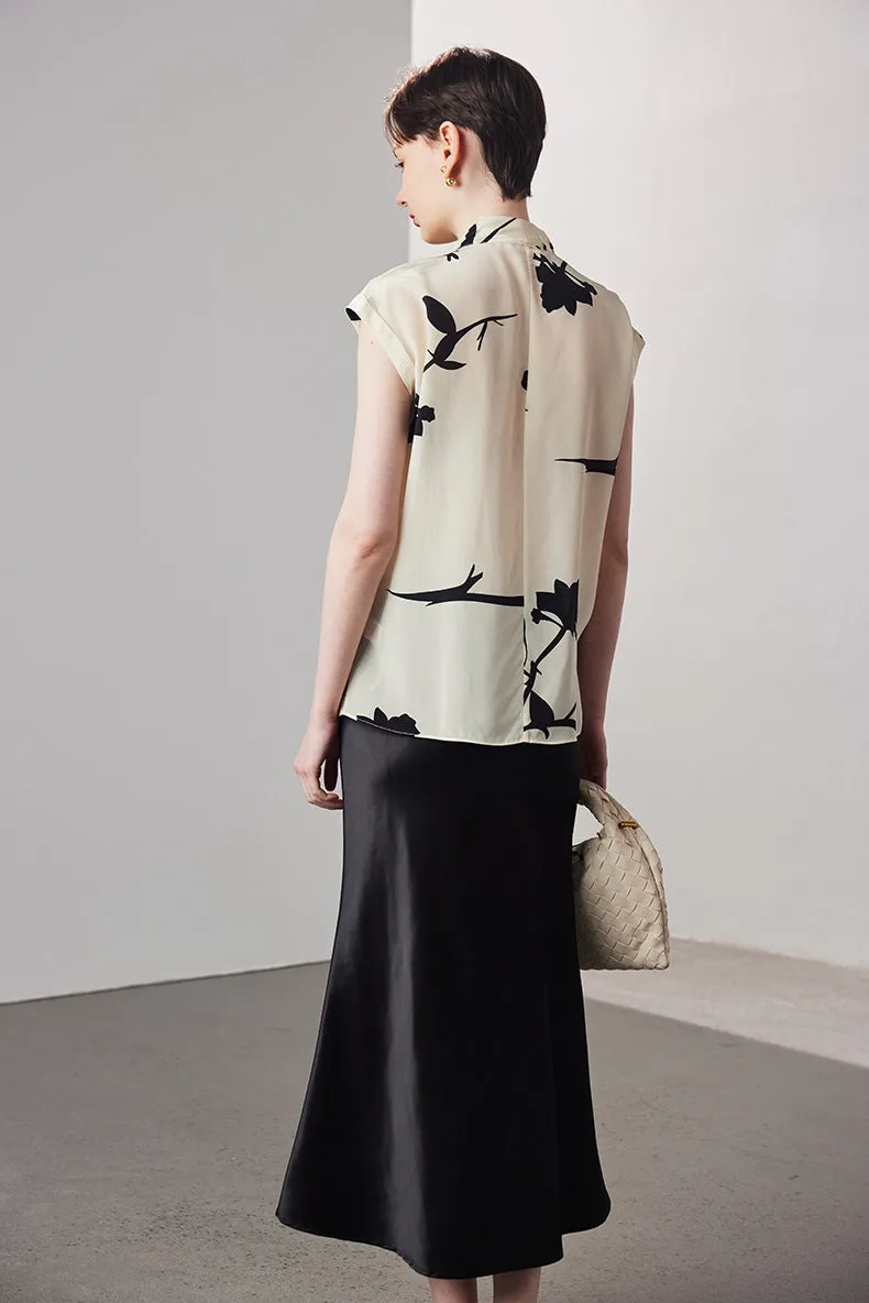 Sleeveless printed V-neck silk blouse
