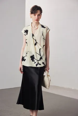 Sleeveless printed V-neck silk blouse